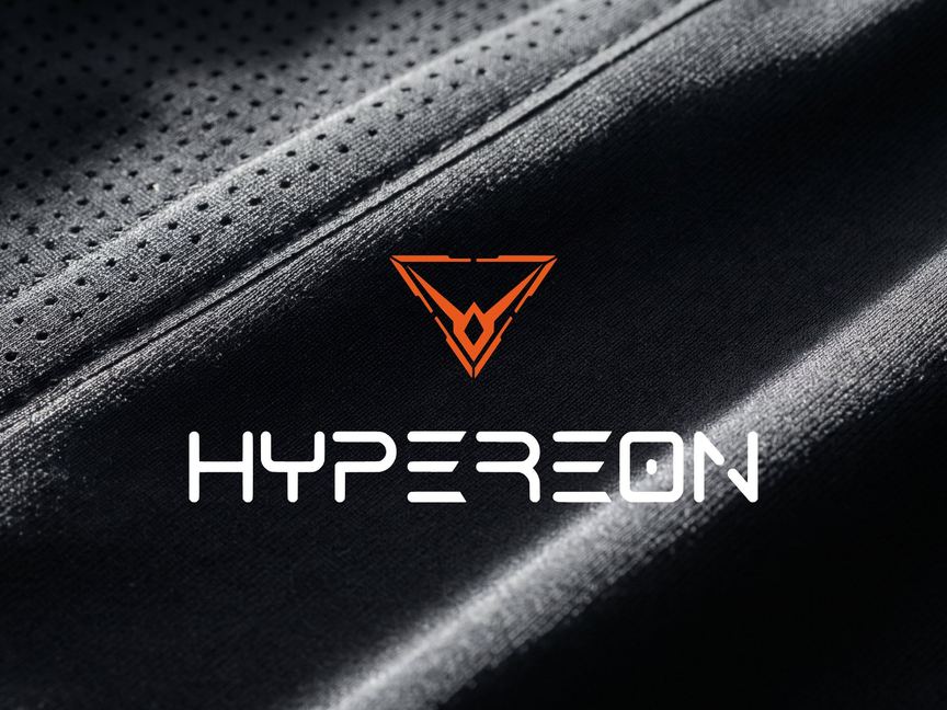 A render of the orange Hypereon mark and the white wordmark on black technical knit